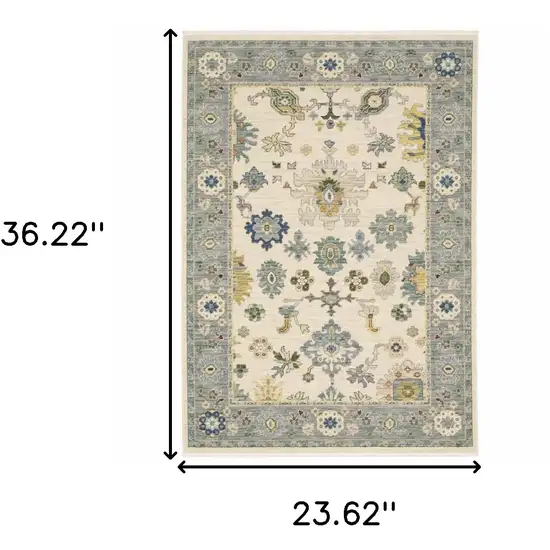 Ivory Blue Grey Teal Gold Green And Rust Oriental Power Loom Stain Resistant Area Rug With Fringe Photo 3