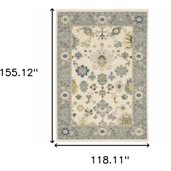Ivory Blue Grey Teal Gold Green And Rust Oriental Power Loom Stain Resistant Area Rug With Fringe Photo 3