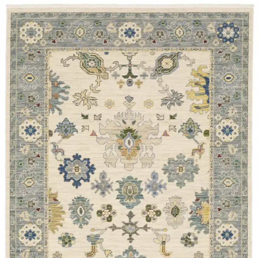 Ivory Blue Grey Teal Gold Green And Rust Oriental Power Loom Stain Resistant Area Rug With Fringe Photo 11