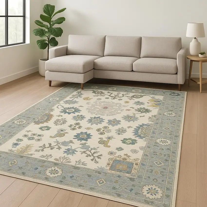 Ivory Blue Grey Teal Gold Green And Rust Oriental Power Loom Stain Resistant Area Rug With Fringe Photo 1