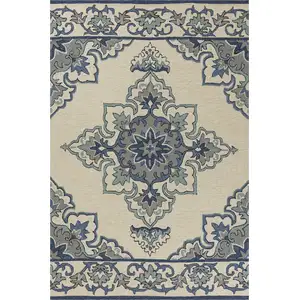 Photo of Ivory Blue Hand Hooked Floral Medallion Indoor Outdoor Accent Rug