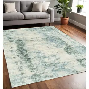 Photo of Ivory Blue Machine Woven Abstract Indoor Area Rug