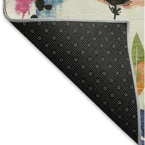 Photo of Ivory Blue Pink And Orange Floral Washable Area Rug With UV Protection