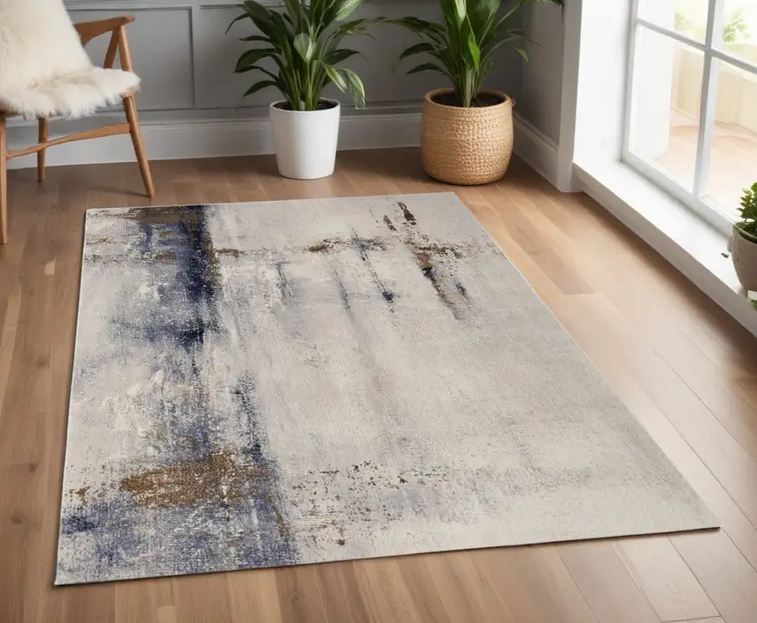 Ivory Blue and Brown Abstract Power Loom Area Rug Photo 1