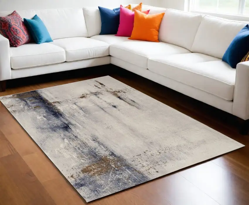 Ivory Blue and Brown Abstract Power Loom Area Rug Photo 1