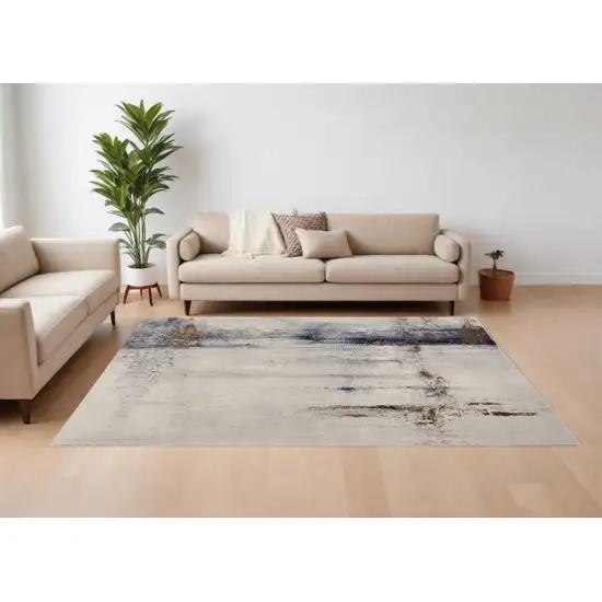 Ivory Blue and Brown Abstract Power Loom Area Rug Photo 1