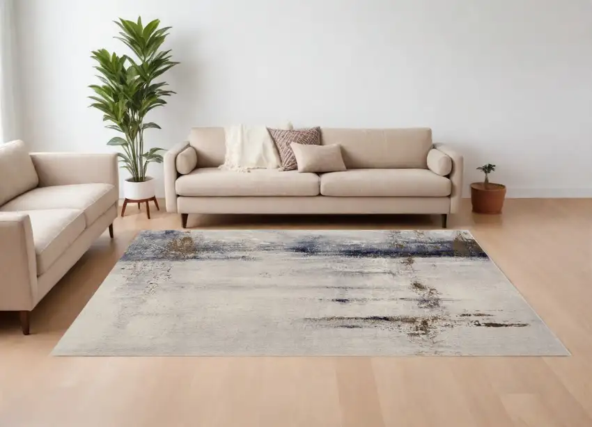 Ivory Blue and Brown Abstract Power Loom Area Rug Photo 1