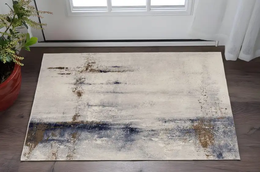 Ivory Blue and Brown Abstract Power Loom Area Rug Photo 1