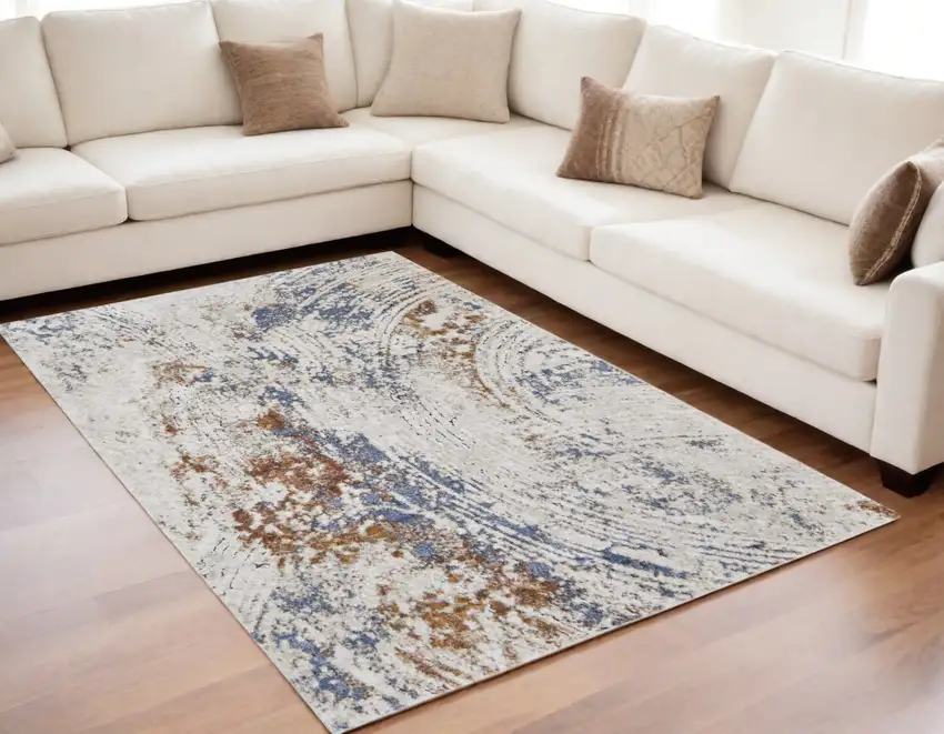 Ivory Blue and Brown Abstract Power Loom Area Rug Photo 1