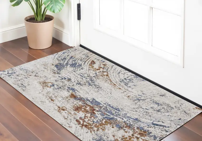 Ivory Blue and Brown Abstract Power Loom Area Rug Photo 1