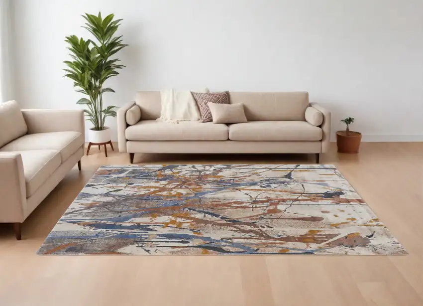 Ivory Blue and Brown Abstract Power Loom Area Rug Photo 1