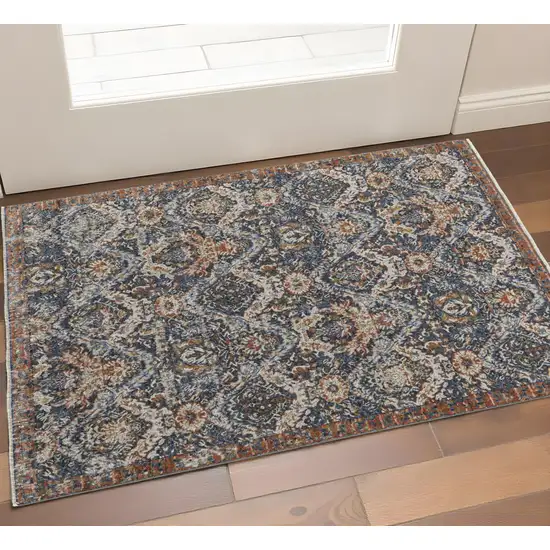 Ivory Blue And Burnt Orange Floral Area Rug With Fringe Photo 1