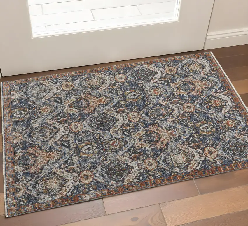 Ivory Blue And Burnt Orange Floral Area Rug With Fringe Photo 1