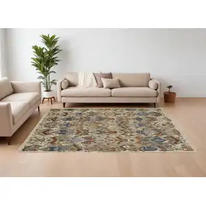 Photo of Ivory Blue and Brown Wool Ikat Hand Knotted Area Rug With Fringe