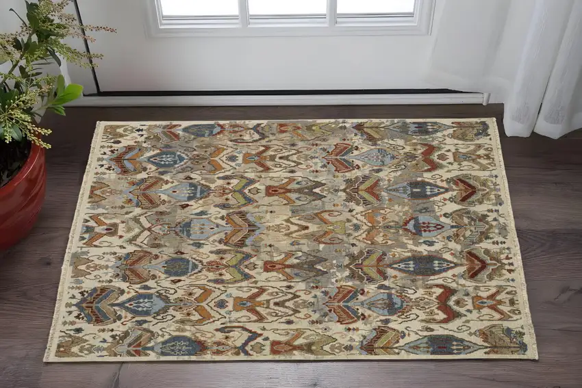 Ivory Blue and Brown Wool Ikat Hand Knotted Area Rug With Fringe Photo 1