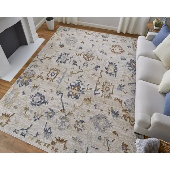 Ivory Blue and Gold Floral Power Loom Worn Faded Area Rug With Fringe Photo 9