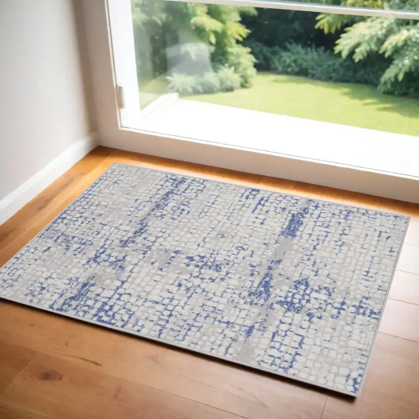Ivory Blue and Gray Abstract Area Rug Photo 1