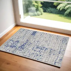 Photo of Ivory Blue and Gray Abstract Area Rug
