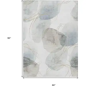 Photo of Ivory Blue and Gray Abstract Washable Non Skid Indoor Outdoor Area Rug