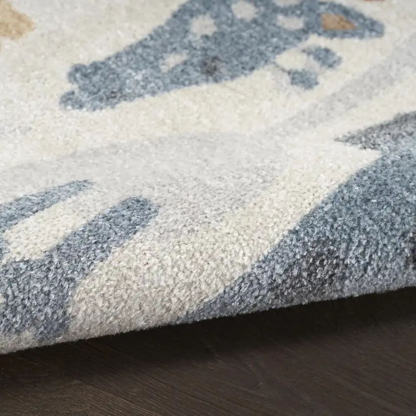5' X 7' Ivory Blue and Gray Animal Print Washable Area Rug Photo 8