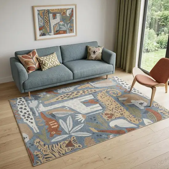 5' X 7' Ivory Blue and Gray Kids Jungle Animal Print Washable Area Rug Photo 1