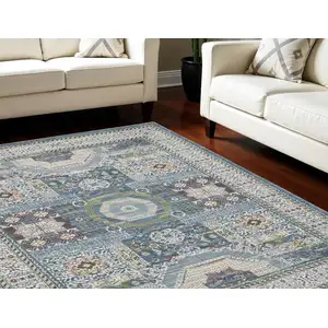 Photo of Ivory Blue and Green Oriental Distressed Non Skid Area Rug