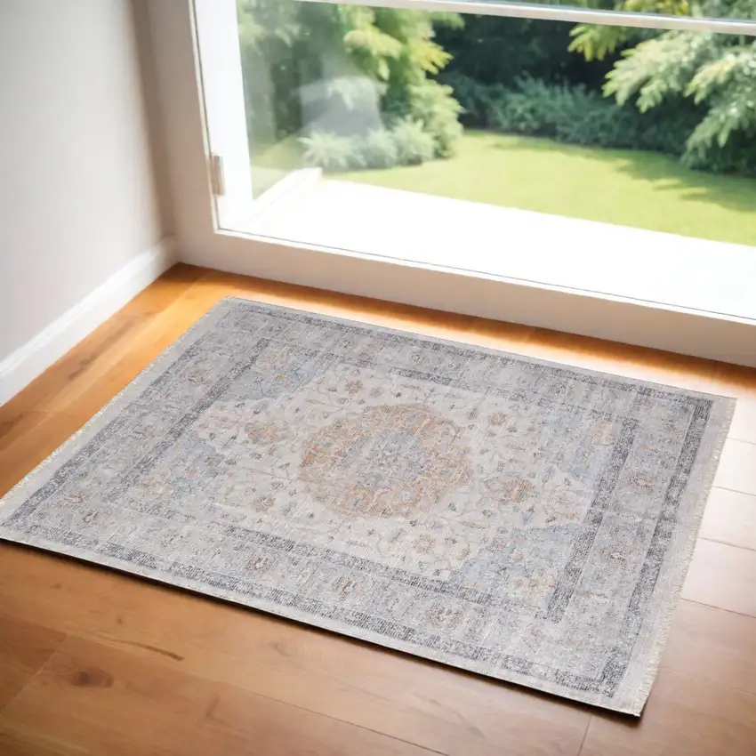 Ivory Blue and Orange Oriental Hand Woven Distressed Area Rug With Fringe Photo 1