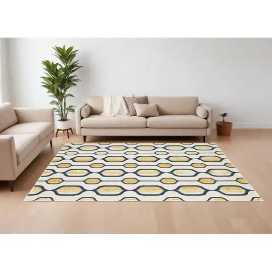 Ivory Blue and Yellow Geometric Power Loom Area Rug Photo 1