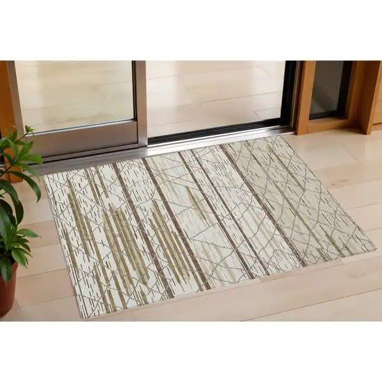 Ivory Brown And Beige Striped Washable Indoor Outdoor Area Rug Photo 1