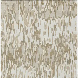 Photo of Ivory Brown And Beige Striped Washable Indoor Outdoor Area Rug