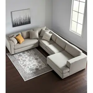 Photo of Ivory Brown And Blue Floral Distressed Area Rug