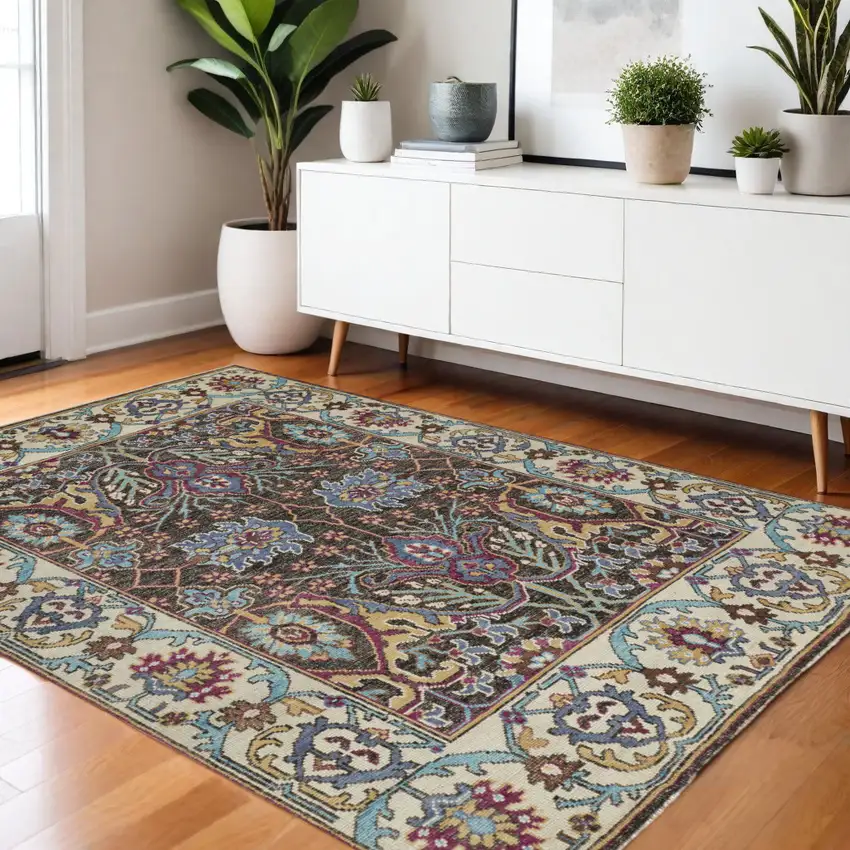 Ivory and Blue Wool Floral Hand Knotted Distressed Area Rug With Fringe Photo 1