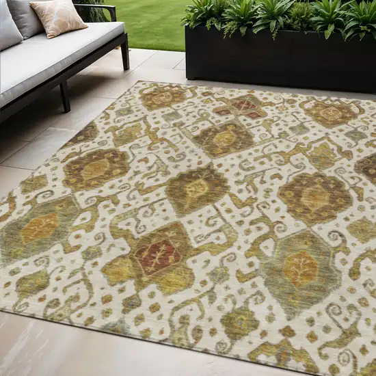 Ivory Brown And Gold Ikat Washable Indoor Outdoor Area Rug Photo 1