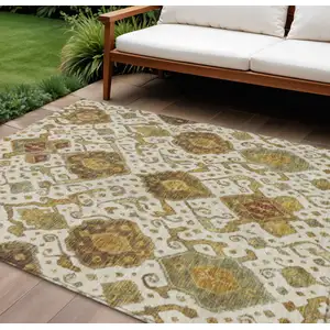 Photo of Ivory Brown And Gold Ikat Washable Indoor Outdoor Area Rug