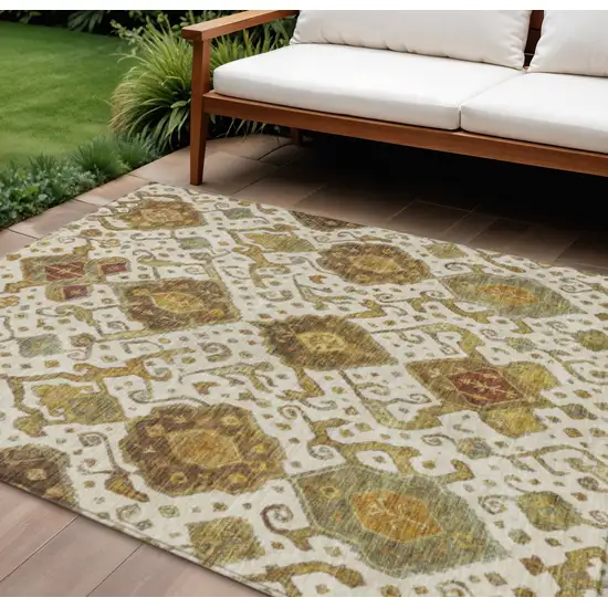 Ivory Brown And Gold Ikat Washable Indoor Outdoor Area Rug Photo 1