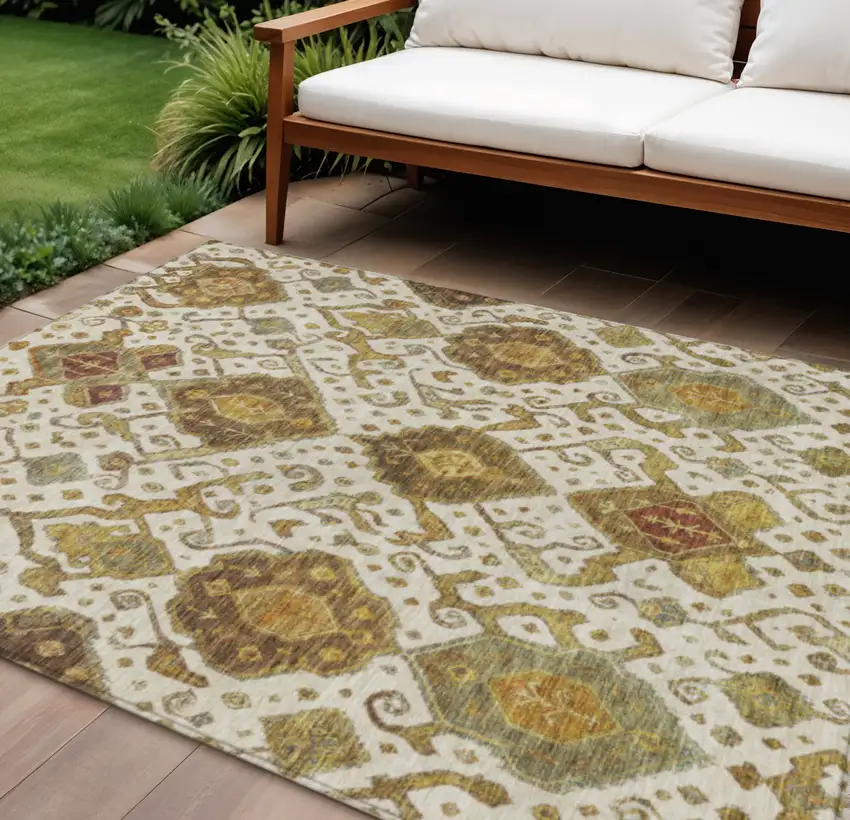 Ivory Brown And Gold Ikat Washable Indoor Outdoor Area Rug Photo 1