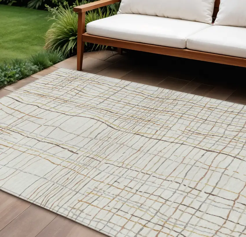Ivory Brown And Gold Striped Washable Indoor Outdoor Area Rug Photo 1