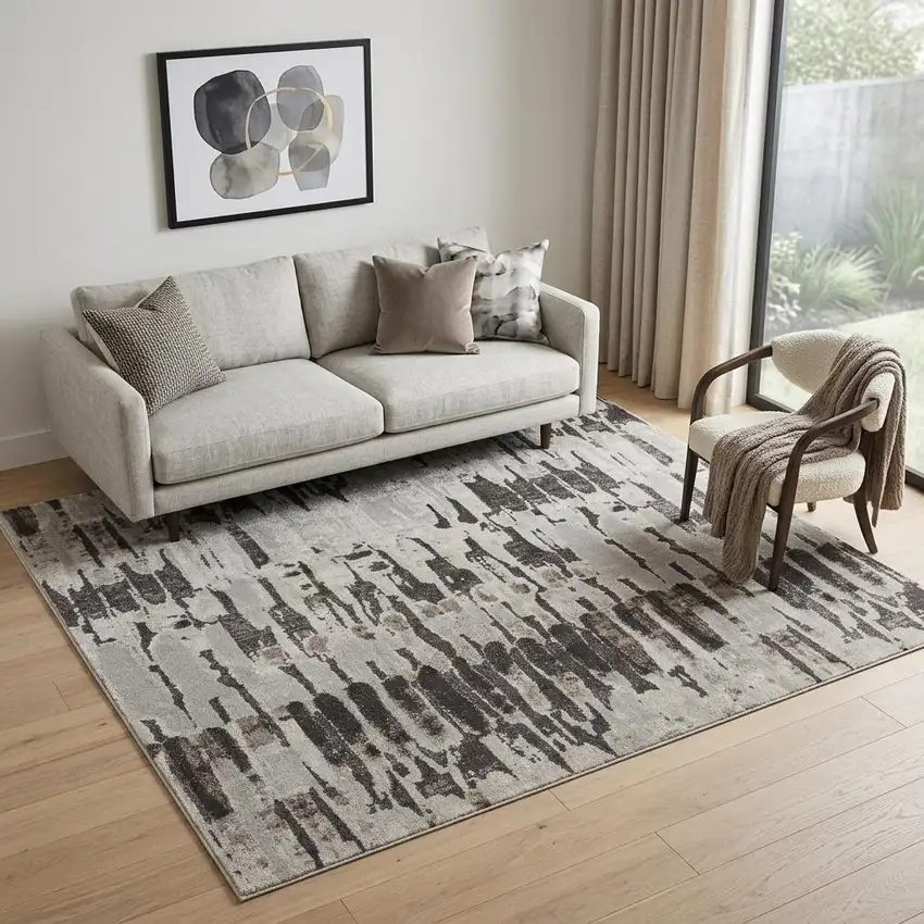 Gray and Ivory Abstract Power Loom Area Rug Photo 1