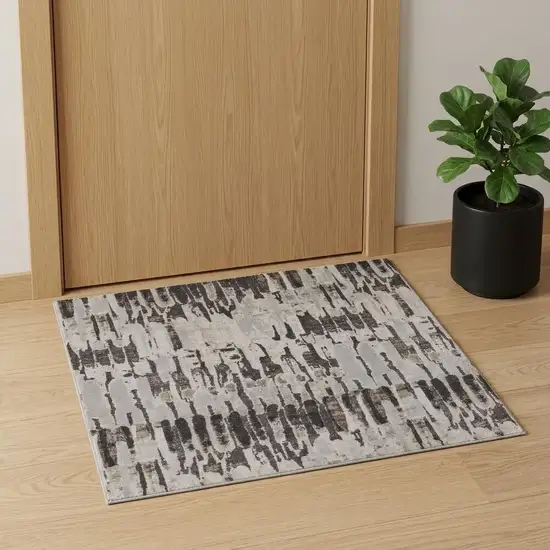 Gray and Ivory Abstract Power Loom Area Rug Photo 1