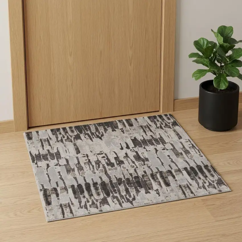 Gray and Ivory Abstract Power Loom Area Rug Photo 1
