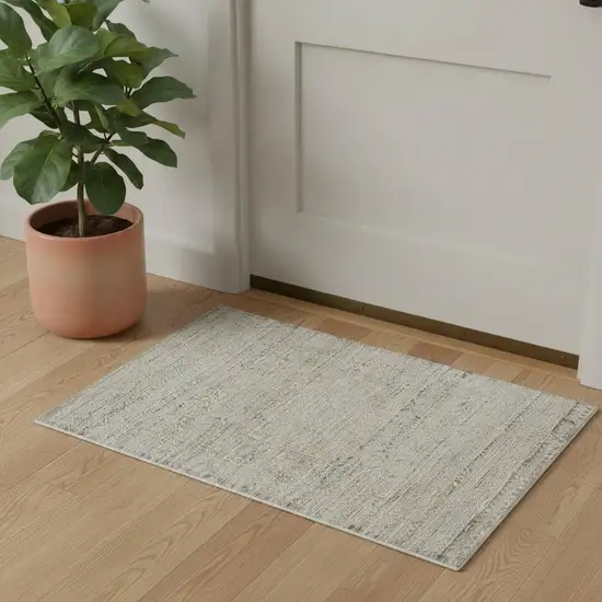 Ivory Brown And Gray Geometric Distressed Area Rug With Fringe Photo 1