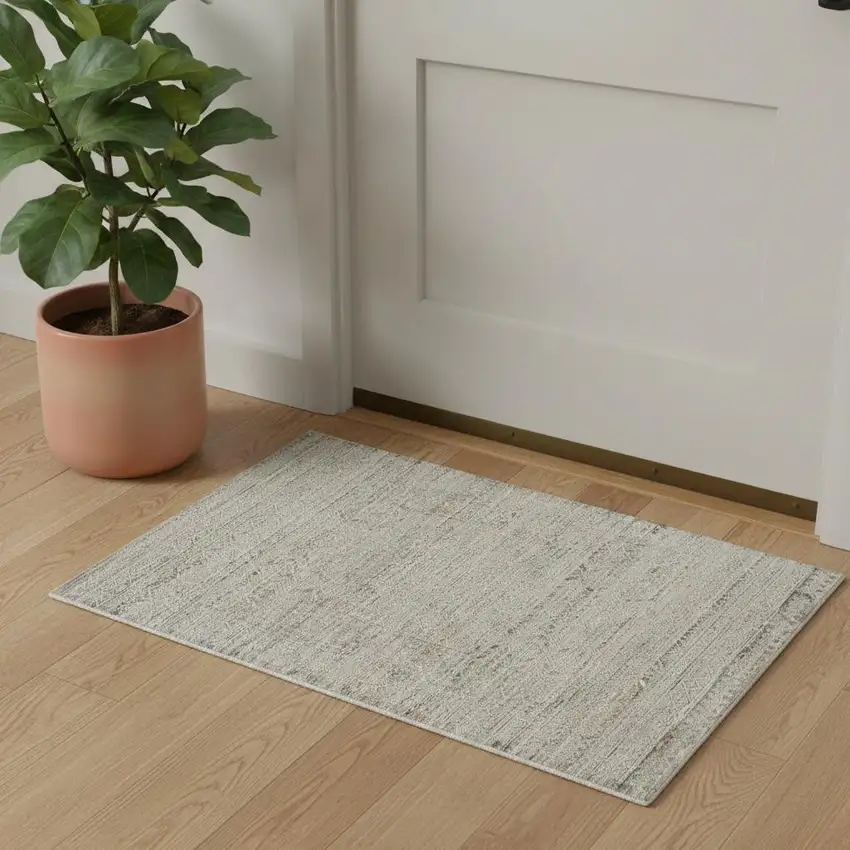 Ivory Brown And Gray Geometric Distressed Area Rug With Fringe Photo 1