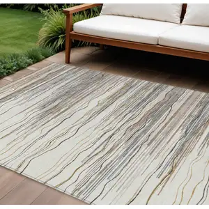 Photo of Ivory Brown And Gray Striped Washable Indoor Outdoor Area Rug
