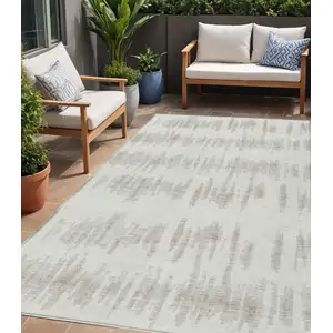 Photo of Ivory Brown And Gray Striped Washable Indoor Outdoor Area Rug