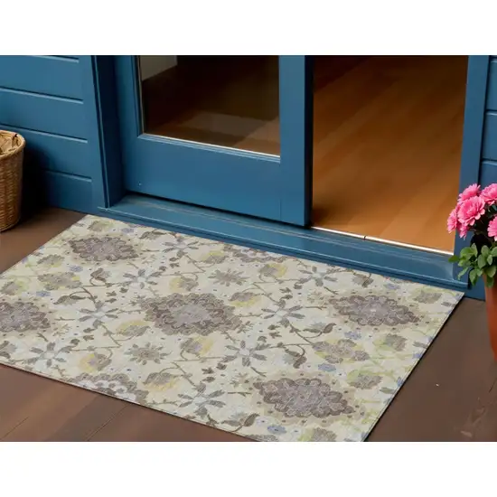 Ivory Brown And Green Oriental Washable Indoor Outdoor Area Rug Photo 1