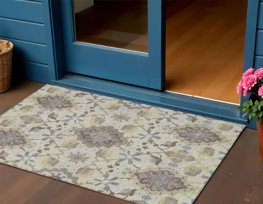 Ivory Brown And Green Oriental Washable Indoor Outdoor Area Rug Photo 1