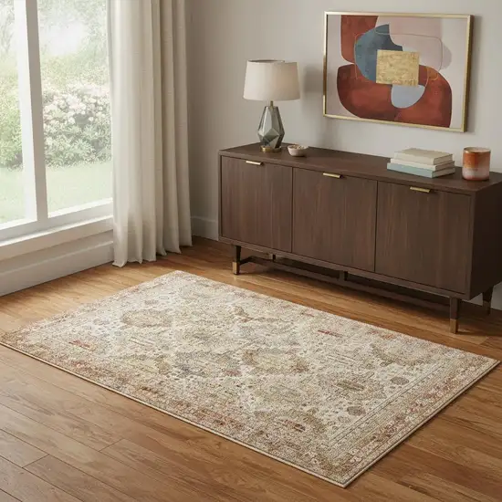 Ivory Brown And Yellow Geometric Distressed Area Rug Photo 1