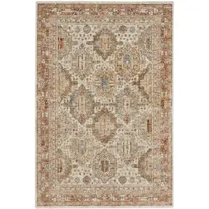 Photo of Ivory Brown And Yellow Geometric Distressed Area Rug