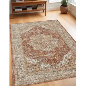 Photo of Ivory Brown And Yellow Oriental Distressed Area Rug