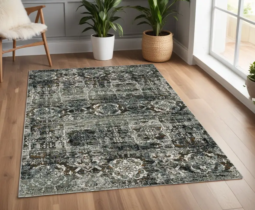 Ivory and Black Oriental Power Loom Area Rug Photo 1